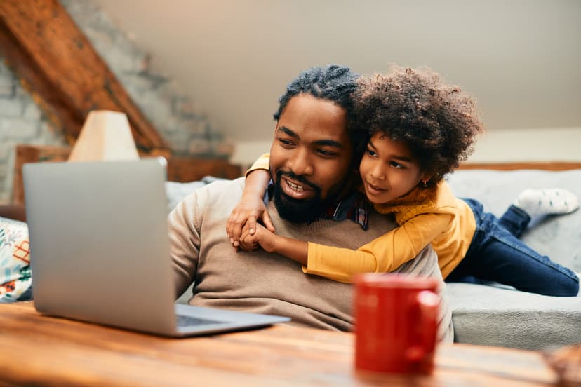 Father and son on laptop